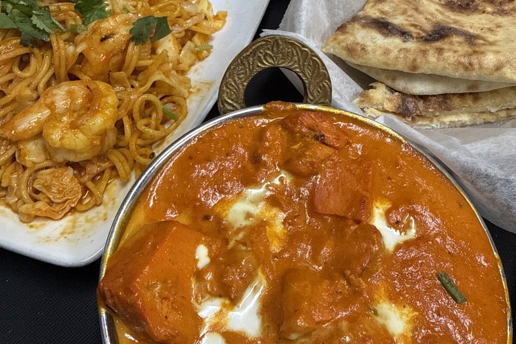 Paneer makhani, shrimp chowmein, rice and naan